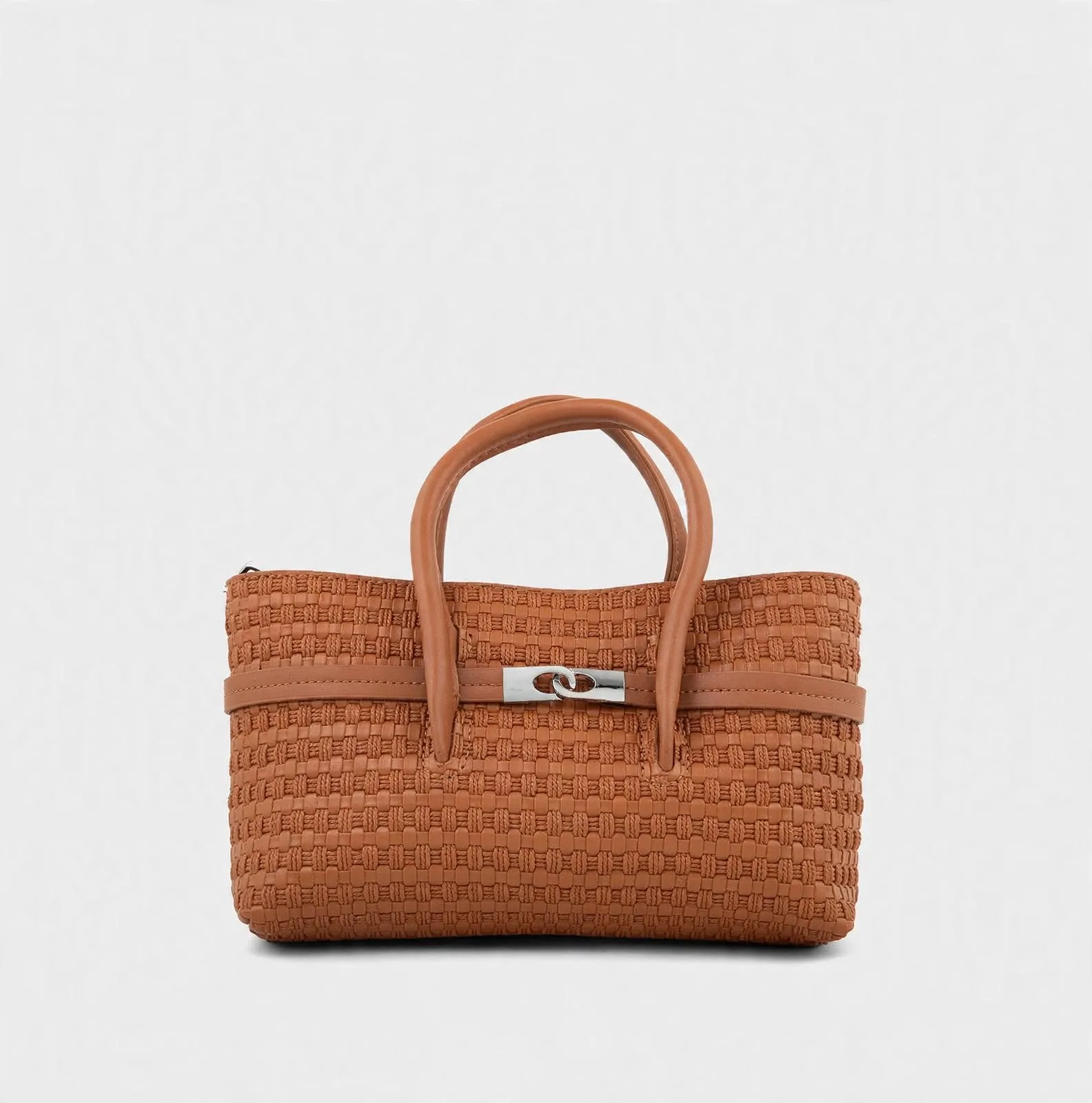Front view of tan camel woven basketweave mini tote bag with short top handles and silver double-loop clasp on white background