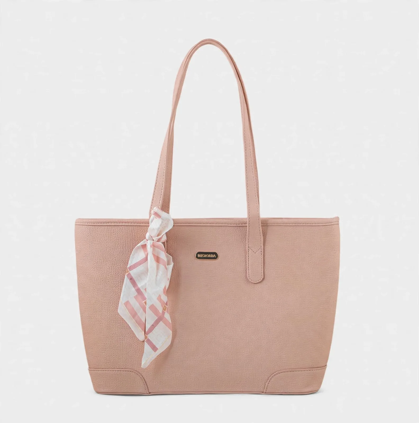 Front view of blush pink tote bag with scarf charm